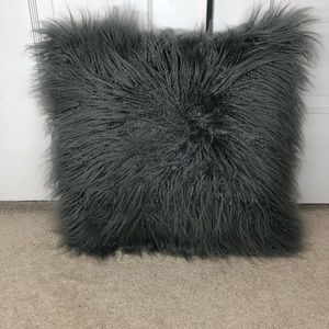 Grey fuzzy throw pillow